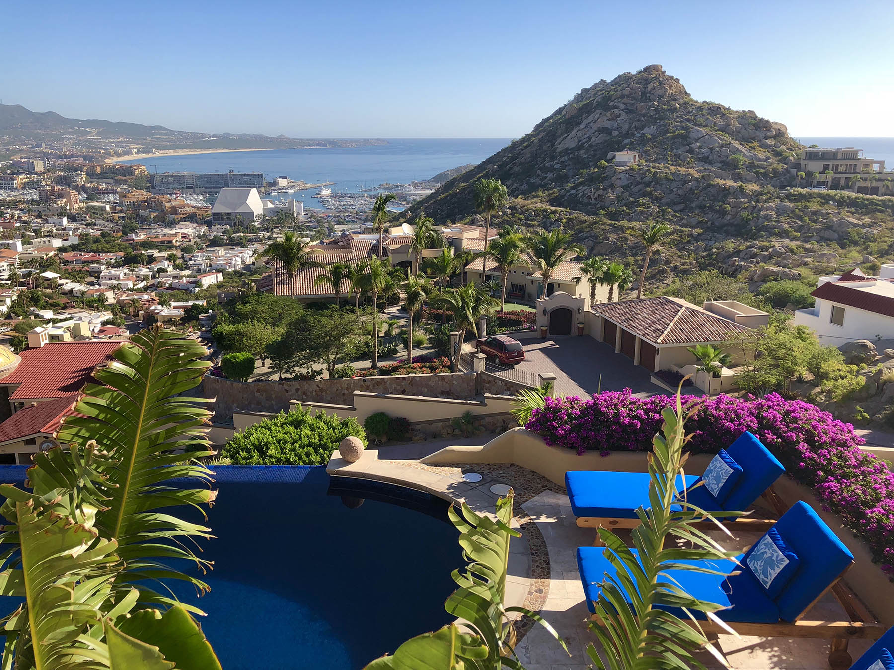 view from upper level of pool and Cabo